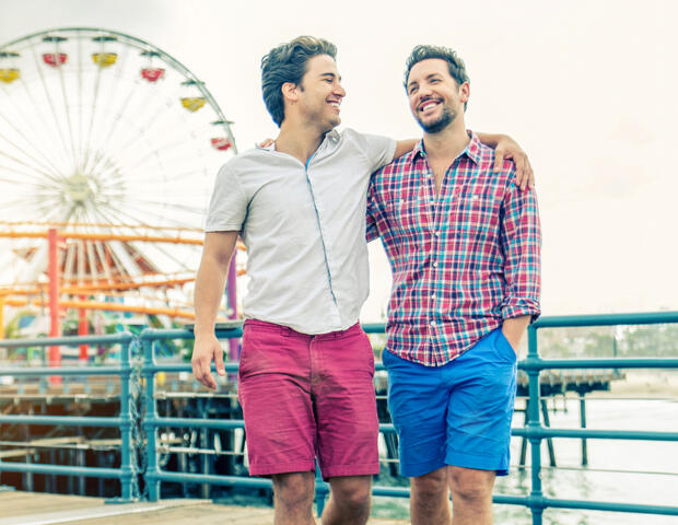 Same sex couple looking pleased after receiving financial planning in Ascot Vale